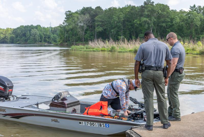 Officers advise a boater