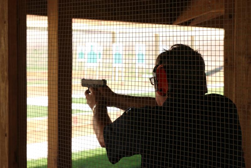 Man shooting a handgun at McIvor Shooting Facility