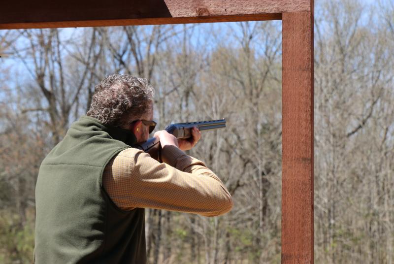 Man shooting shotgun at McIvor Shooting Facility